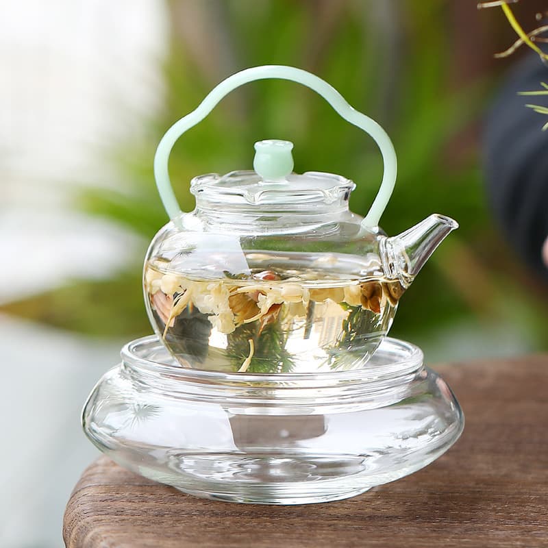 Thickened, high-temperature resistant, small-capacity glass teapot with handle, suitable for open flame brewing of tea, household use, flower tea cold brew pot.