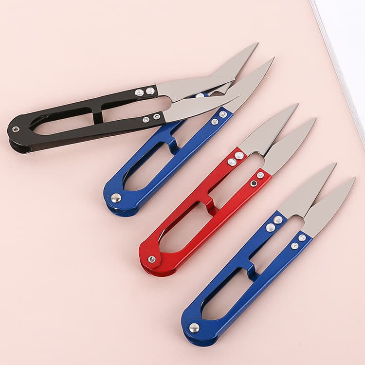Cross-stitch wrought iron thread cutters, wholesale U-shaped spring tailor scissors, thread trimmers, fishing line cutters, and everyday small scissors.