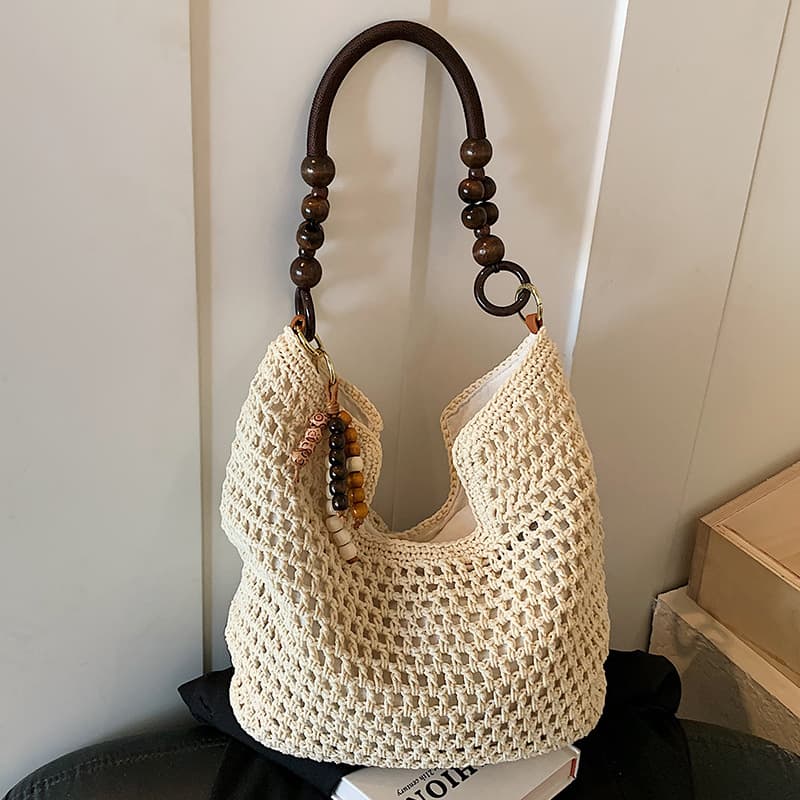Coastal Vacation Style Fashion Hollow Beach Bag for Women 2026 New Woven Shoulder Bag Large Capacity Commuter Tote