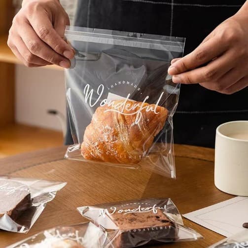 Transparent self-adhesive bread packaging bags for sliced toast, donuts, bagels, small buns, and baking, resealable