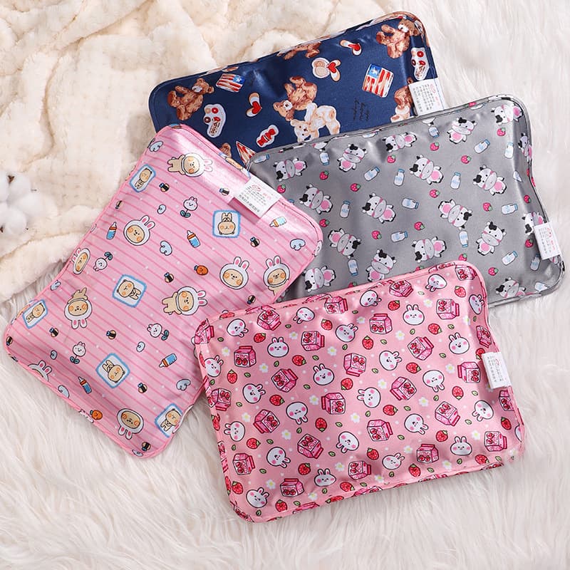 Wholesale safe cartoon electric hot water bag, silk-finish rechargeable hand warmer, new style, portable winter hand warmer.