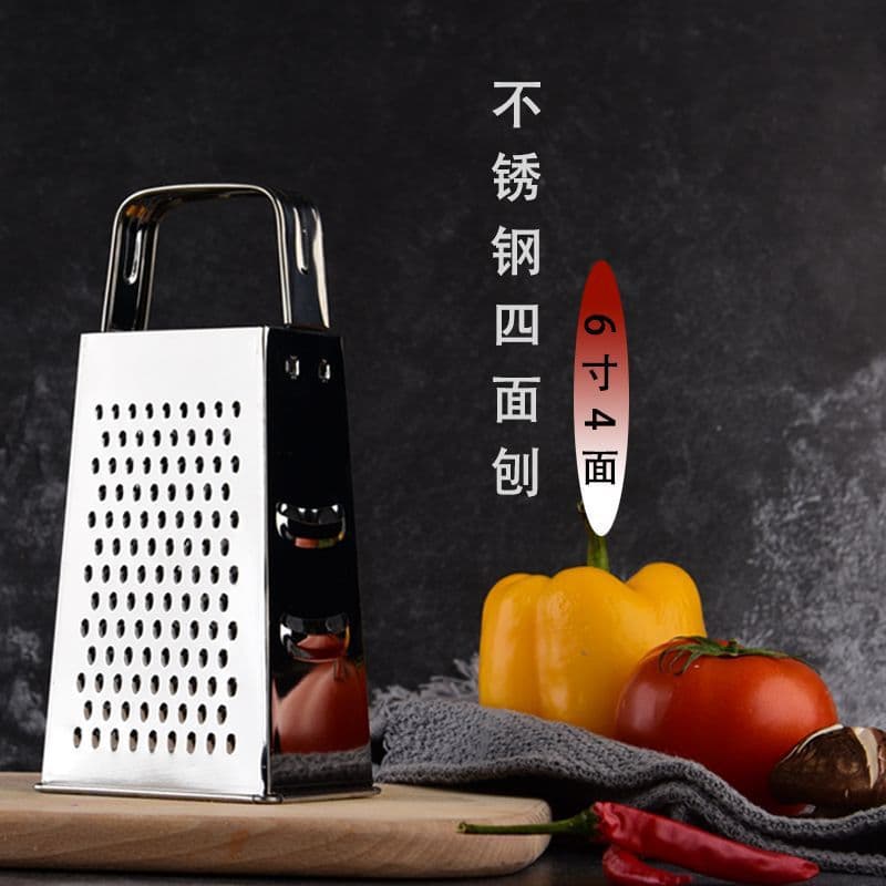 Small stainless steel vertical home vegetable cutter, four-sided grater for cucumber slices, potato shreds, and minced garlic.
