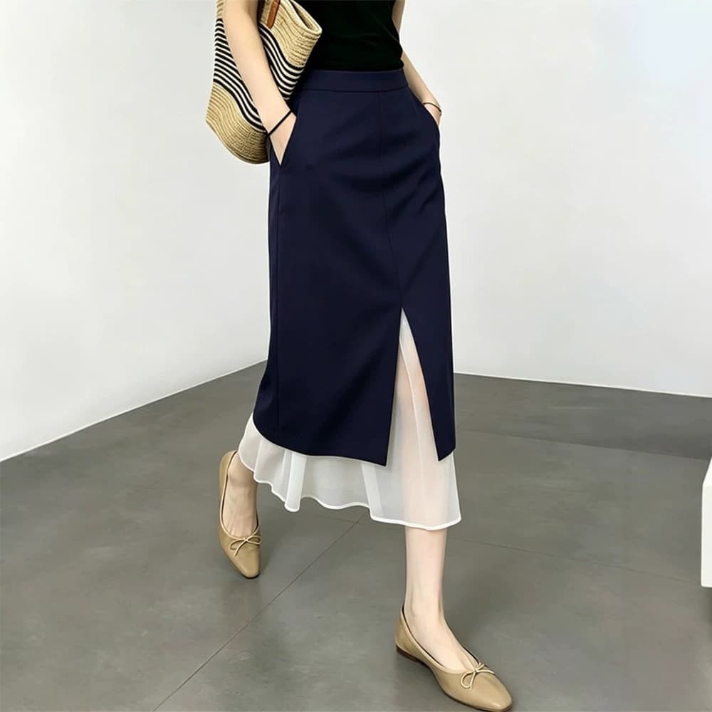 Navy blue light luxury slit skirt for women 2026 summer new fashion commuting stitching high-end straight long skirt