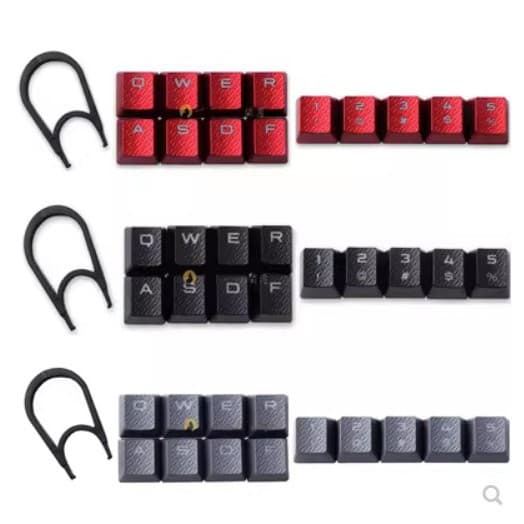 Corsair K70RGB mechanical keyboard with original ABS keycaps (gray and red) and 10 additional universal keycaps for gaming.
