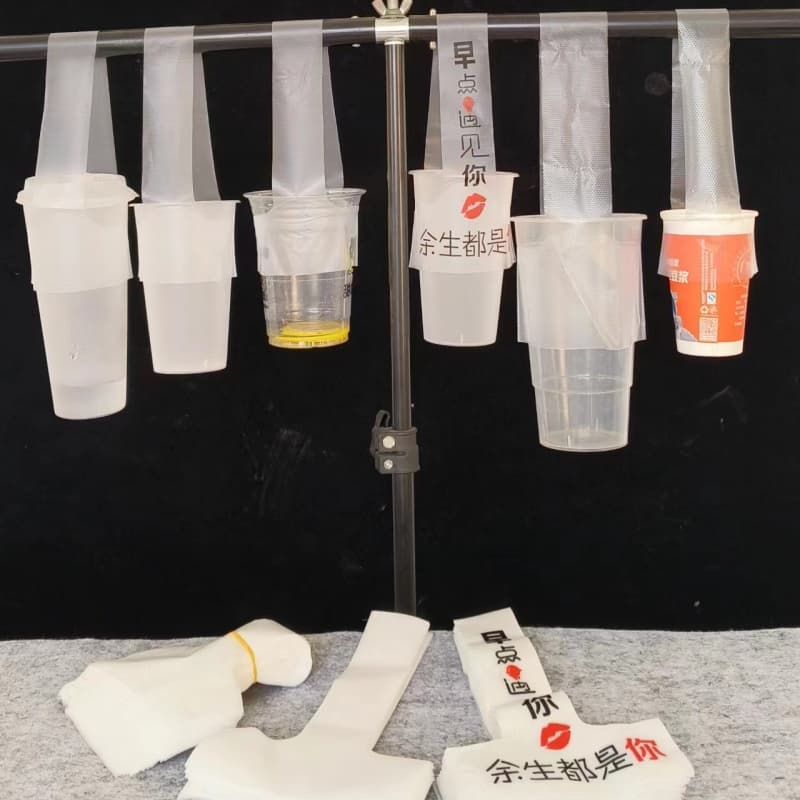 Thickened bayonet T-shaped bag Oriental breakfast soy milk cup milk tea beverage bag porridge plastic bag can be customized with logo printing
