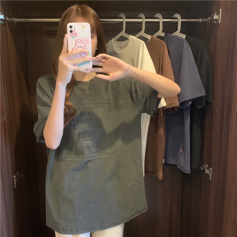 Korean style loose-fitting mid-length T-shirt with embossed lettering, round neck and shoulders, suitable for wholesale export. 2023 summer niche short-sleeved T-shirt.