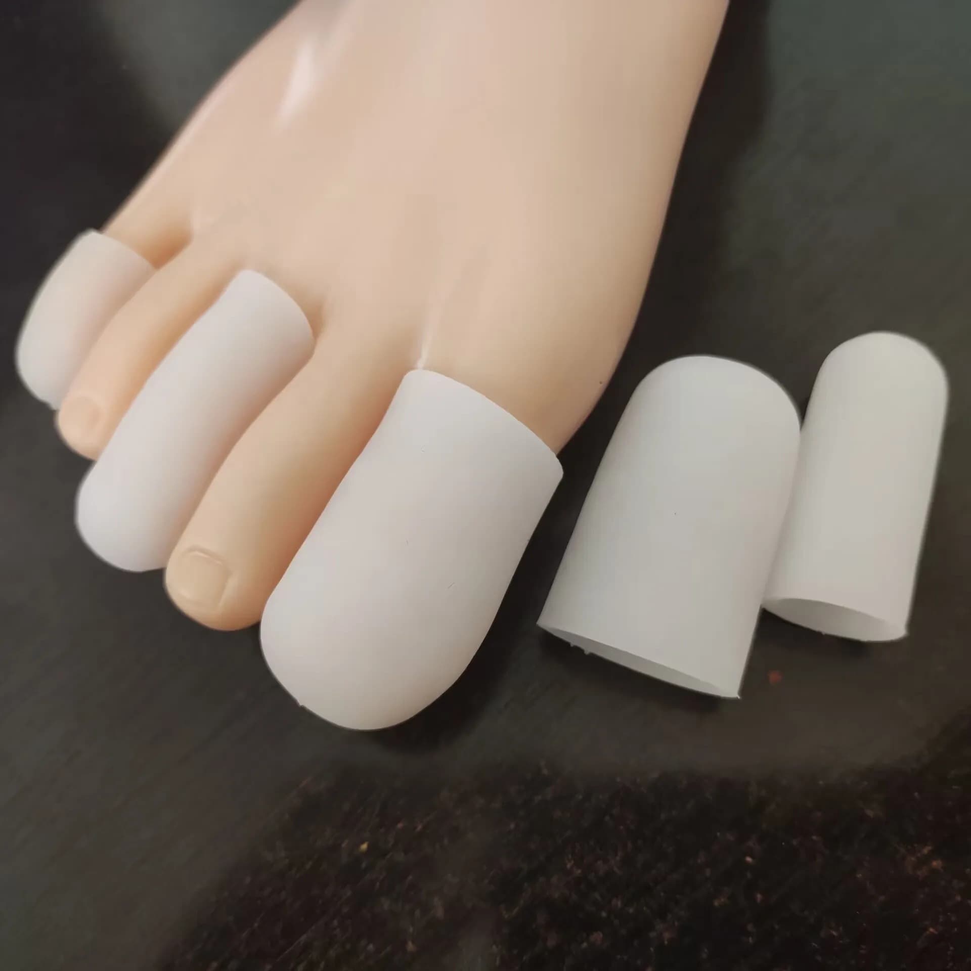 Toe protectors, soccer toe sleeves, silicone toe protectors.