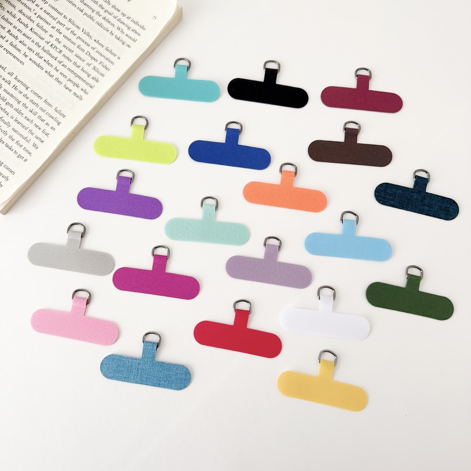 Phone lanyard pads, phone case lanyard clips, anti-loss clips, and other pads available for wholesale.