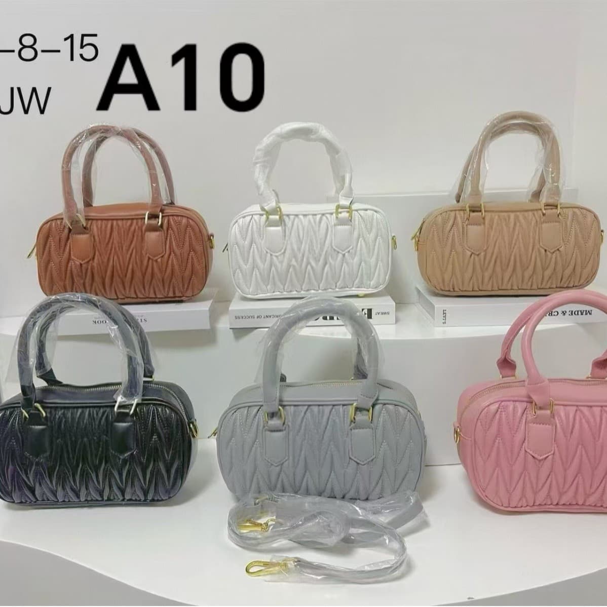 Fashion new 2024 niche design pleated women's small square bag commuting to work one-shoulder crossbody handheld miu series 1