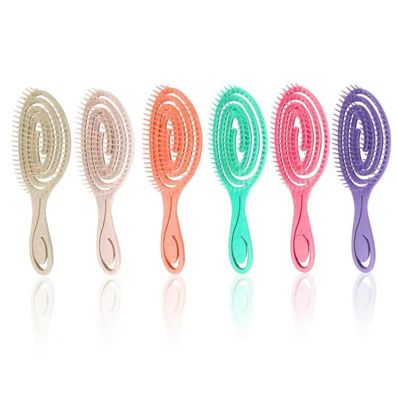 Cute and adorable mosquito coil-shaped/loop comb with openwork design, smooths hair, massages, anti-static, quick-drying, a popular hair styling product.