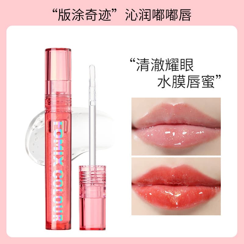 FOMIX Crystal Shine Lip Gloss, a glossy, mirror-like finish for plump lips, used as a lip base, layered with a clear shimmering lip oil.