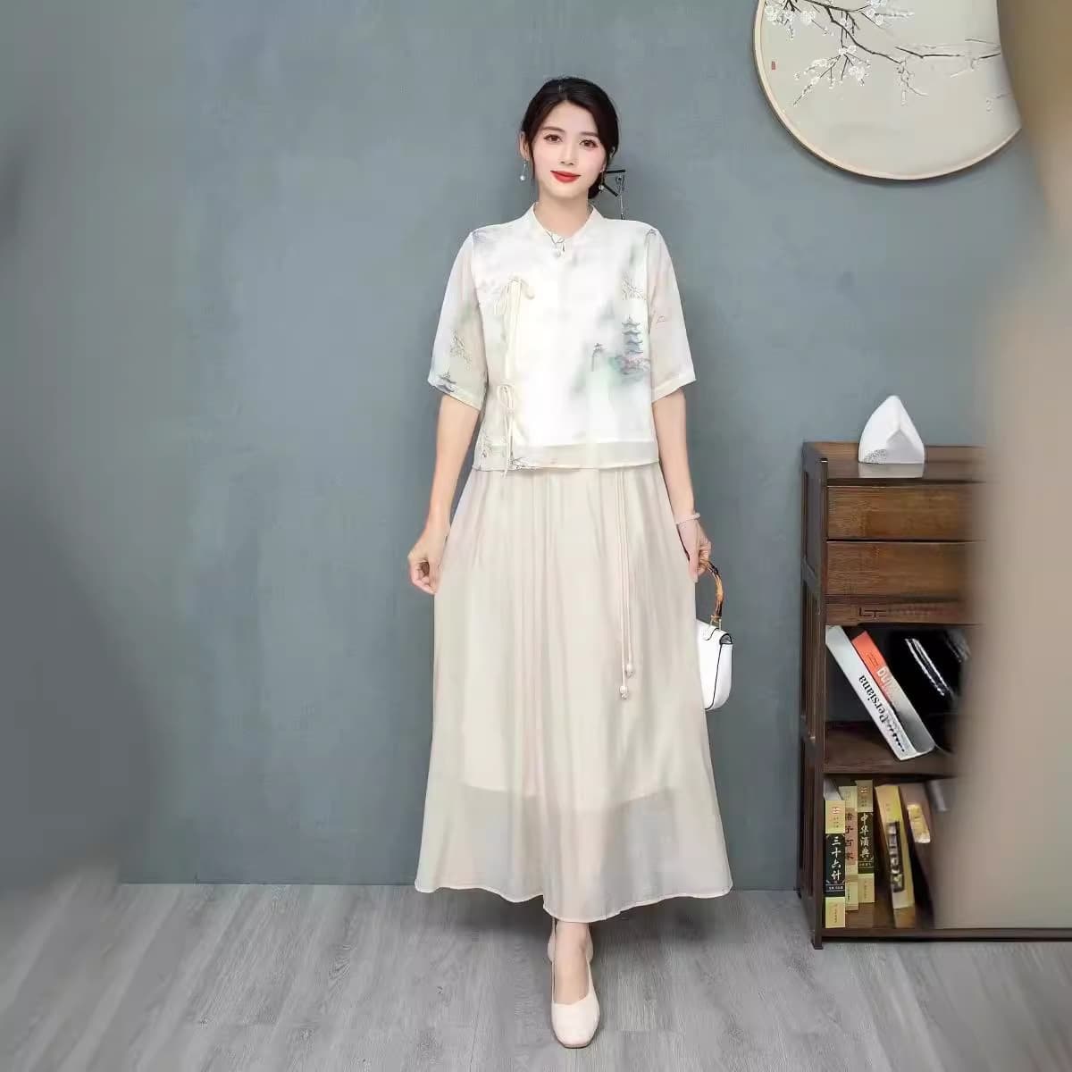 New Chinese-style modified Tang suit Hanfu set for women, featuring a chiffon blouse with ink-wash print skirt and traditional Chinese elements.