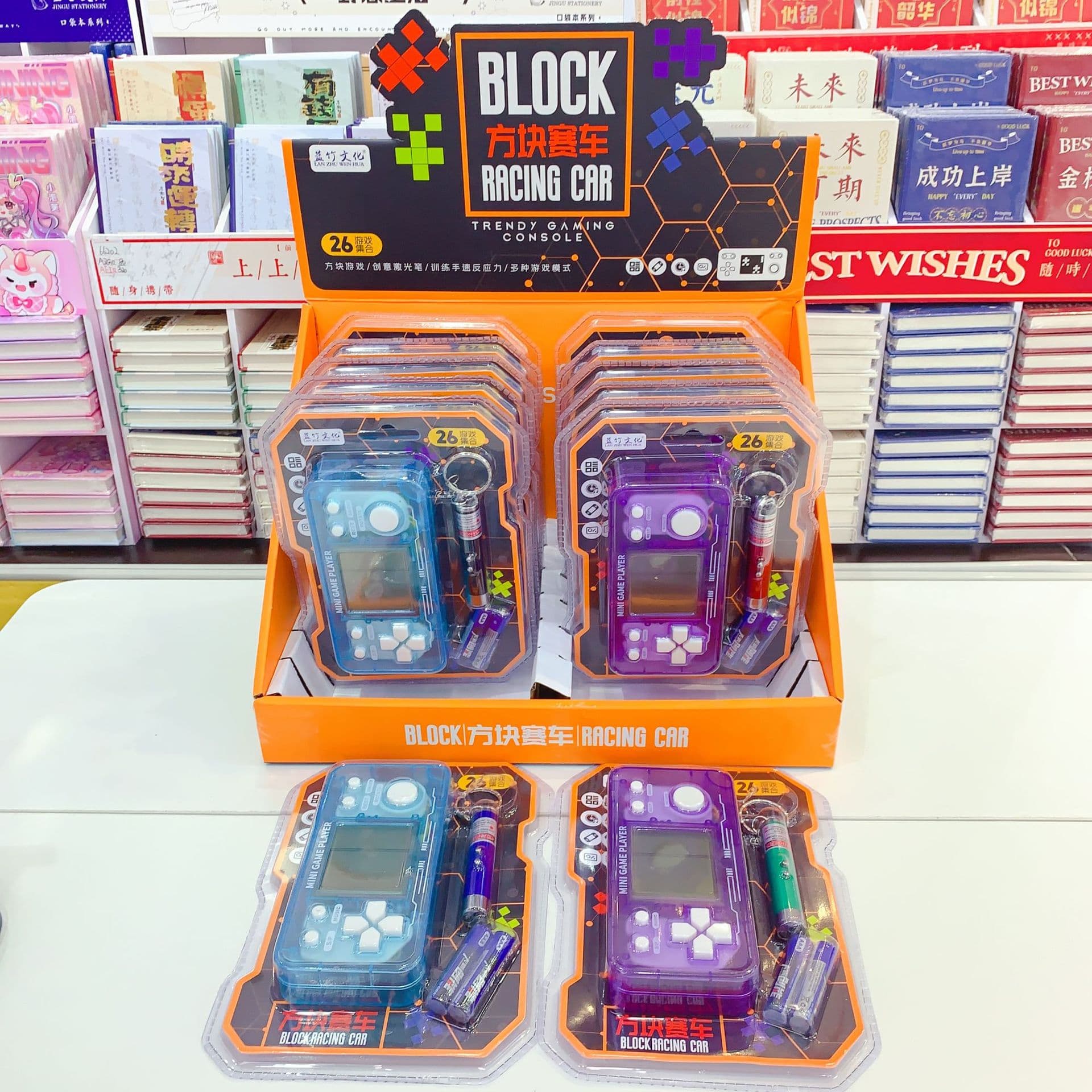 Transparent minimalist horizontal handheld game console with 26 game collection, block racing vertical game console with laser light