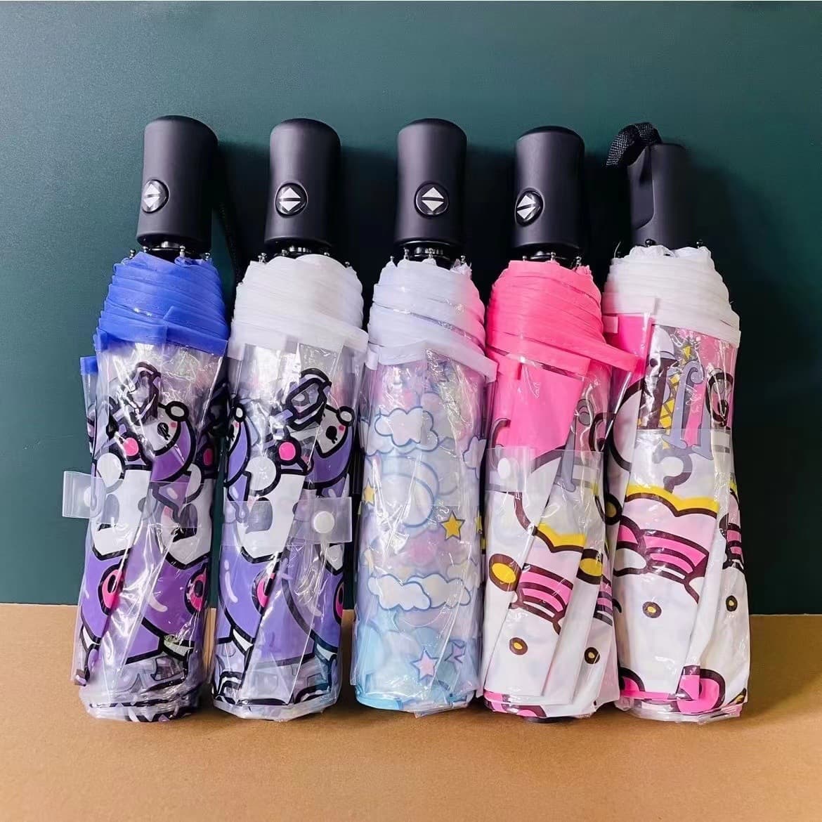 Creative white-handled, transparent, three-fold, fully automatic, cute folding umbrella for girls, students, and children.