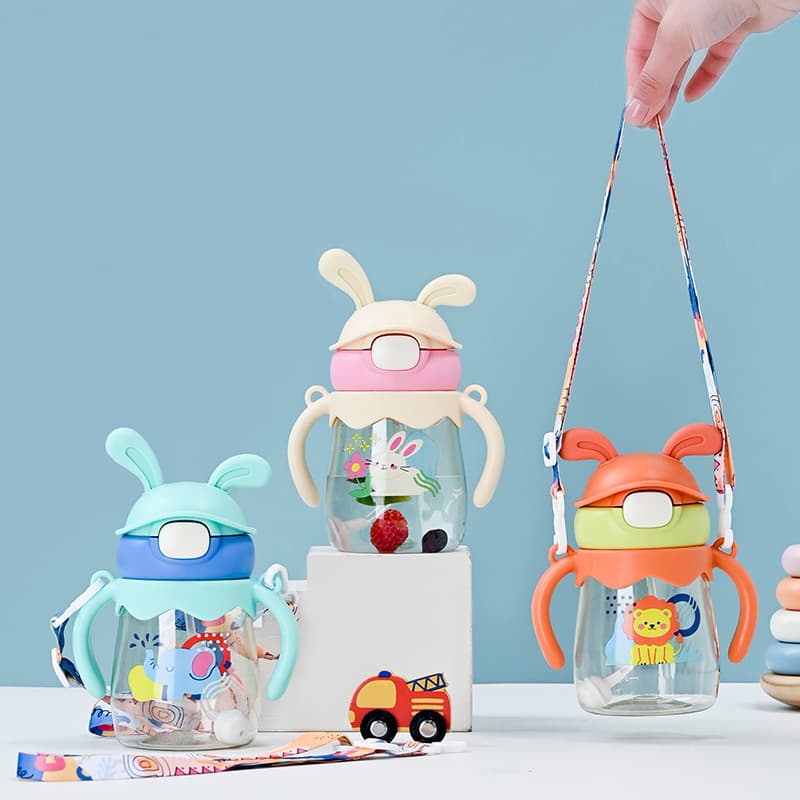 Children's cartoon colorful handle strap plastic pc portable outdoor straw cup kettle new