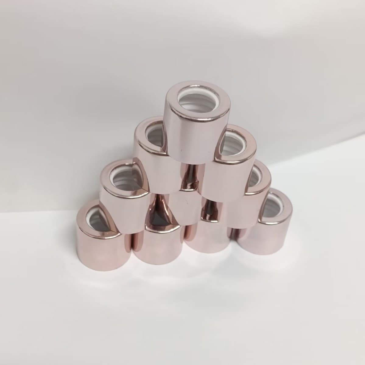 Cross-border factory direct sale 13 teeth 15x14 rose gold color and size can be customized and can be used for punching circle essential oil bottles