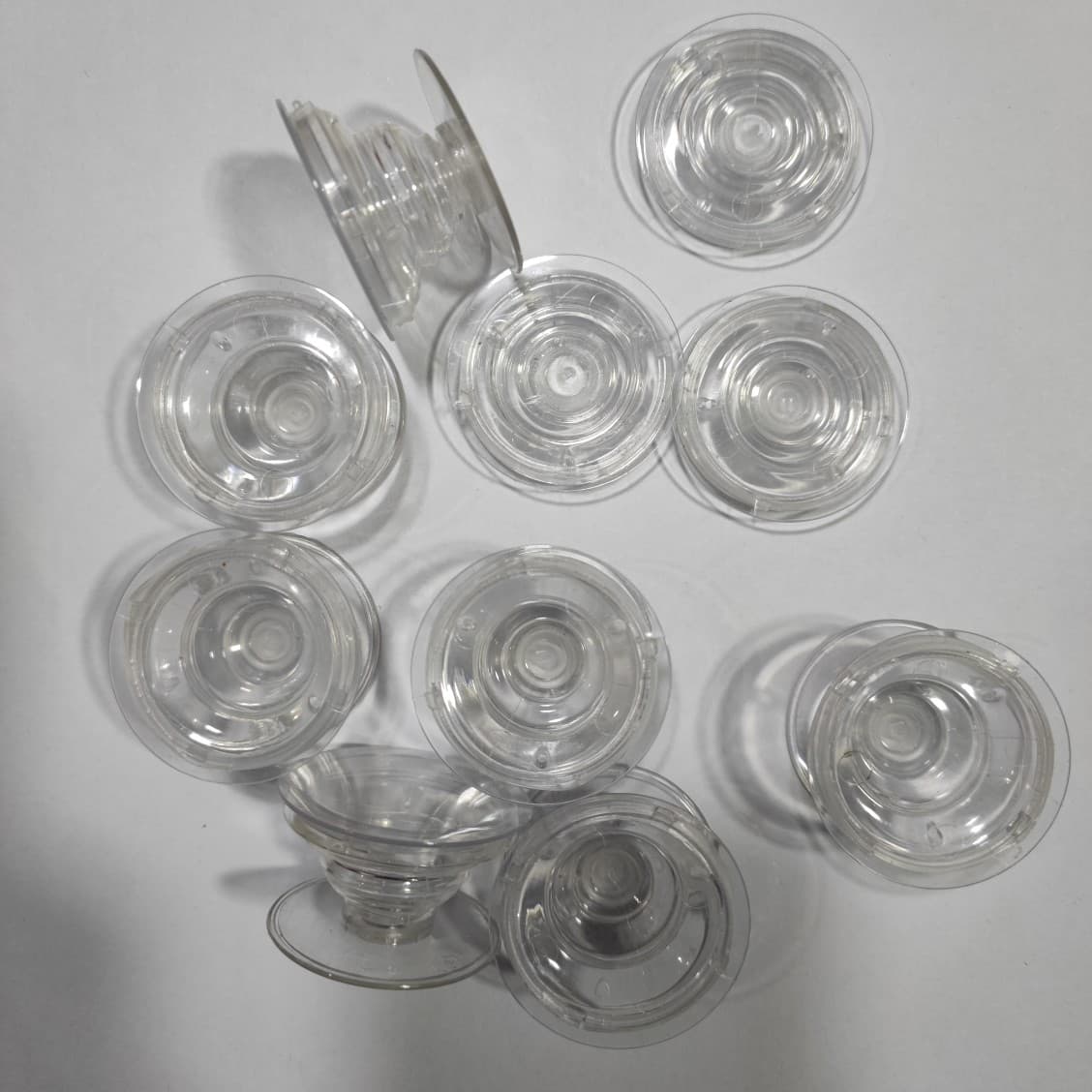 Transparent air cushion holder material, groove and flat transparent material, retractable and foldable lazy phone stand with removable adhesive