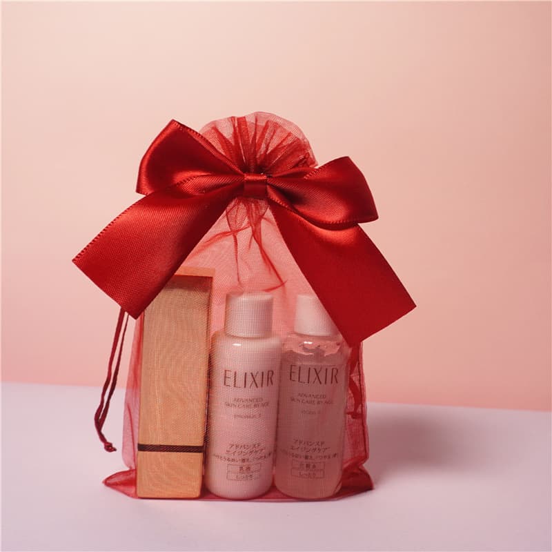 Wholesale cosmetic sample packaging bags, gift bags, bow-tie transparent mesh high-end red gift bags