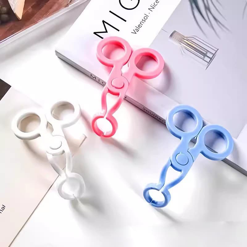 Tools for Opening and Removing Clips to Assist Eyelids in Wearing Large Eye Clips for Contact Lenses