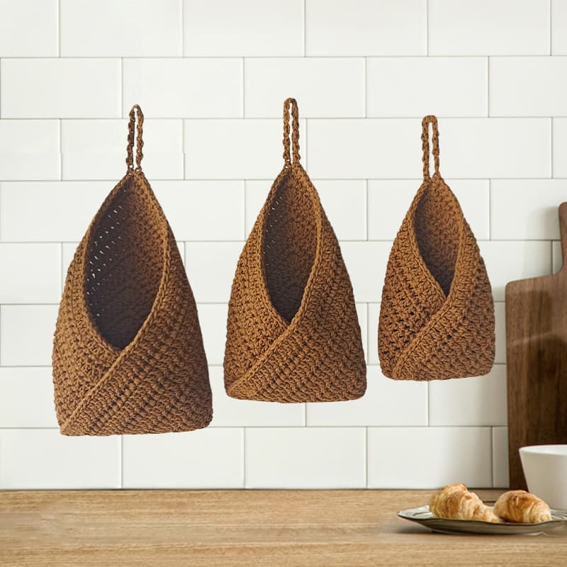 Handmade crochet wall-mounted storage bag for household onion, ginger and garlic storage bag kitchen wall fruit and vegetable hanging basket