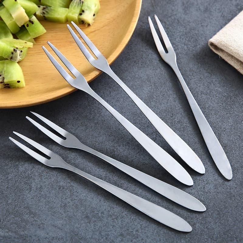 Small two-prong stainless steel dessert forks for fruit and pastry serving