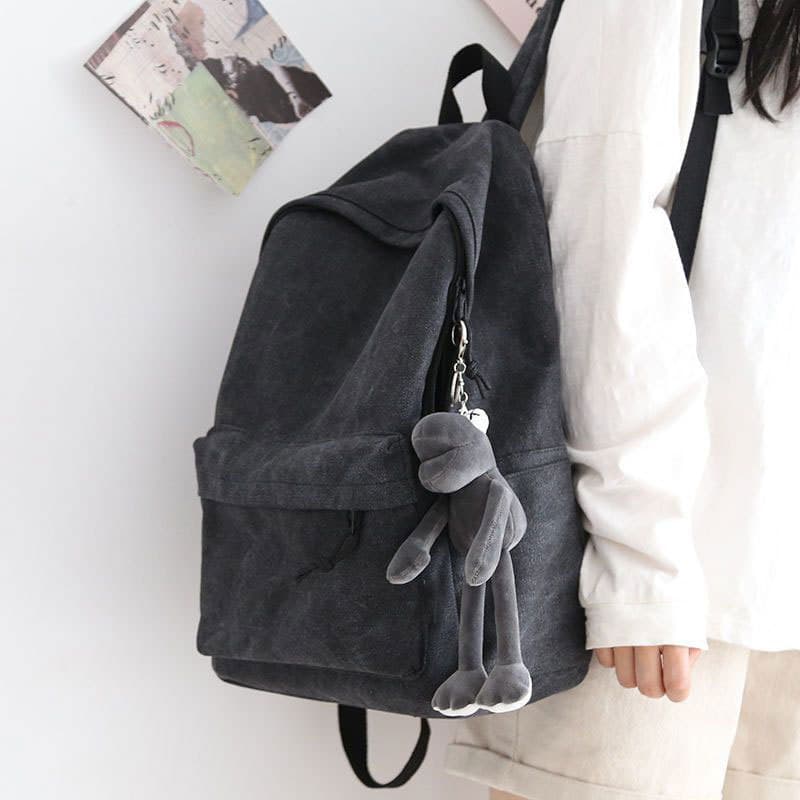 Wear-resistant canvas solid color large-capacity backpack for women 2025 new versatile school bag for high school students travel backpack for men
