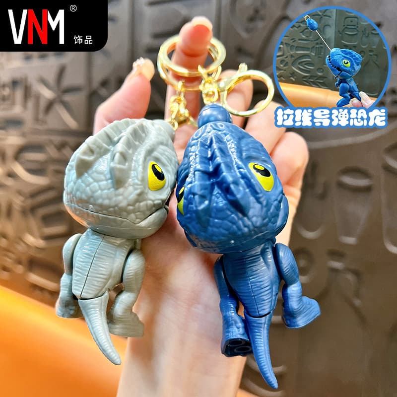 Cartoon pull string dinosaur keychain teething dinosaur hanging chain creative portable toys small gifts school bag pendant wholesale