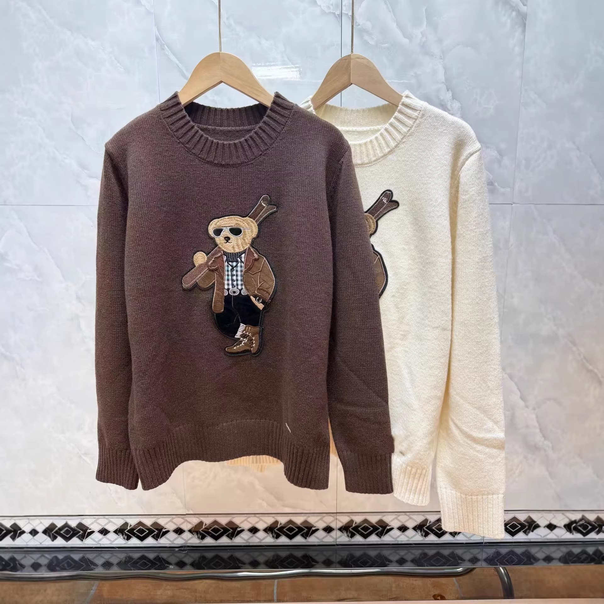 Shenzhen Nanyou 2026 high-end women's clothing bear three-dimensional decoration round neck embroidered letters wool sweater sweater