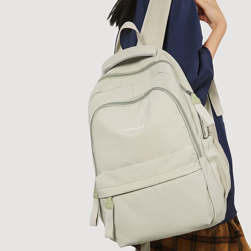 School bag Japanese large-capacity versatile backpack for junior high school students lightweight simple backpack for men and women durable and resistant to dirt and tide