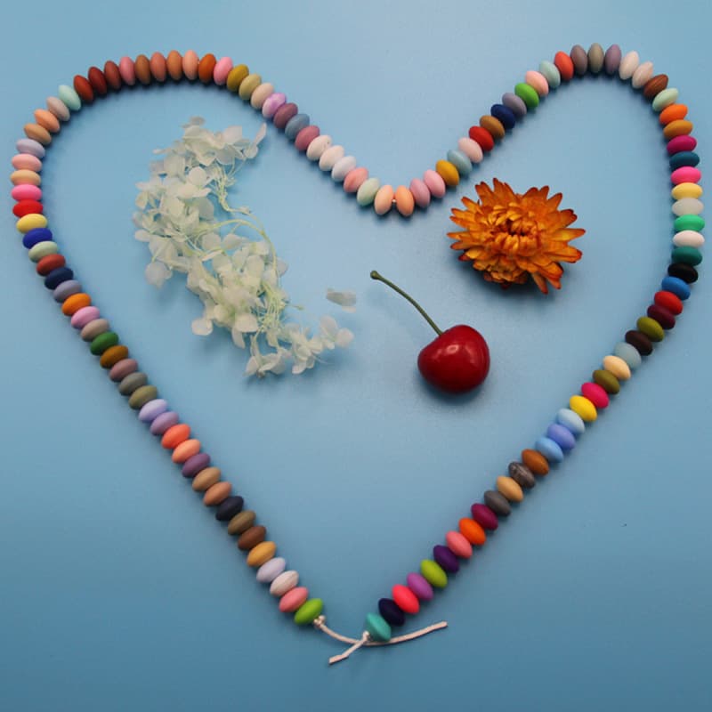 DIY silicone flat beads, pacifier chain accessories, 12mm abacus beads, bulk silicone colored beads wholesale.
