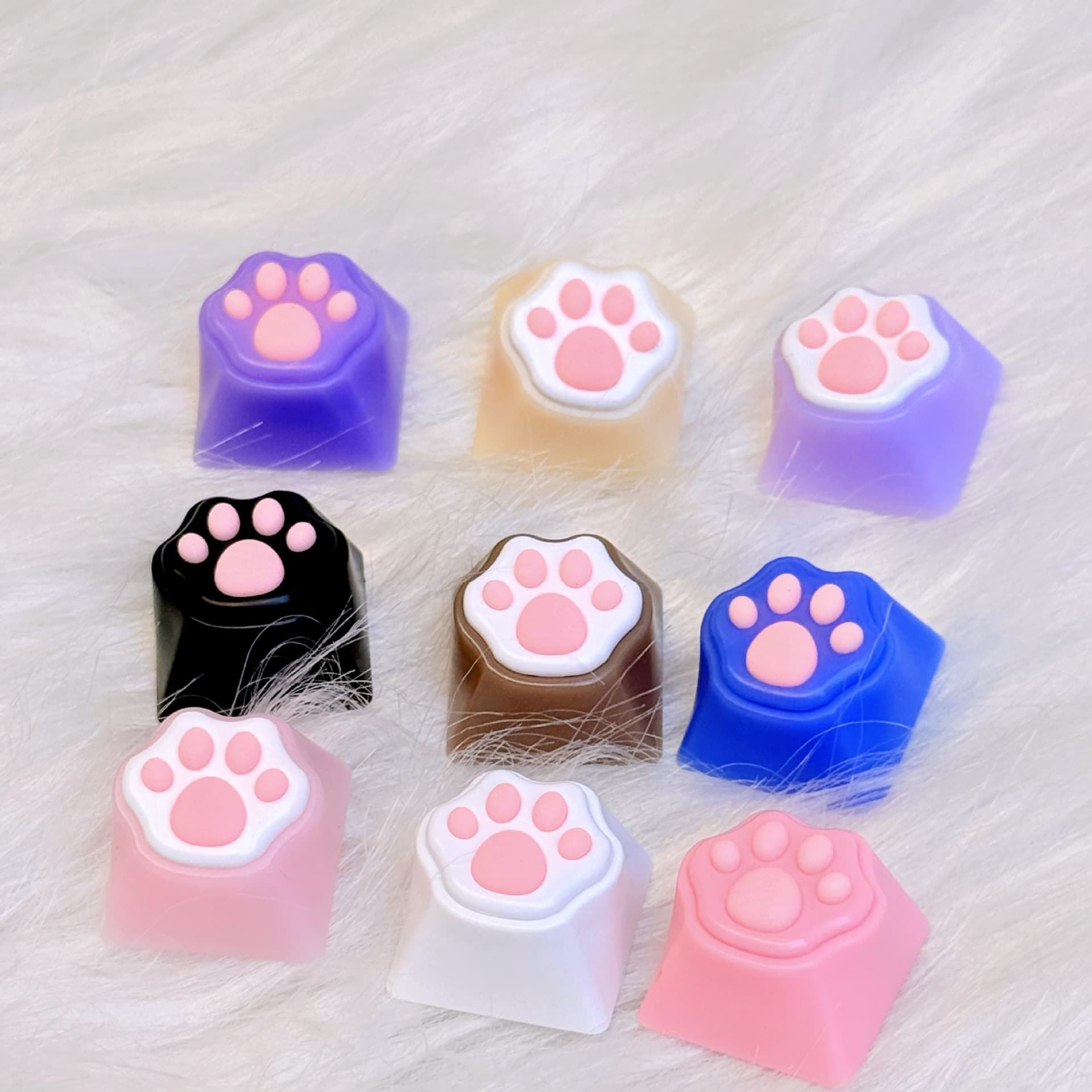 Wholesale available cross-border cute pink cat paw keycaps, personalized soft and bouncy mechanical keyboard cross-shaped keycaps.