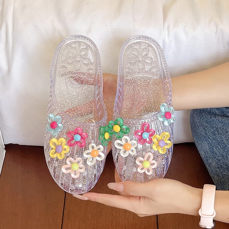 Korean style jelly shoes for women, fashionable outer wear, toe-toe shoes, flower accessories, flat-soled half-slippers, transparent crystal beach slippers