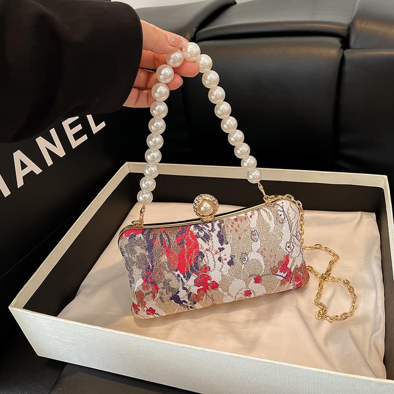 New Chinese style embroidered pearl hand-held evening bag for women 2025 new trendy retro niche one-shoulder cross-body box bag