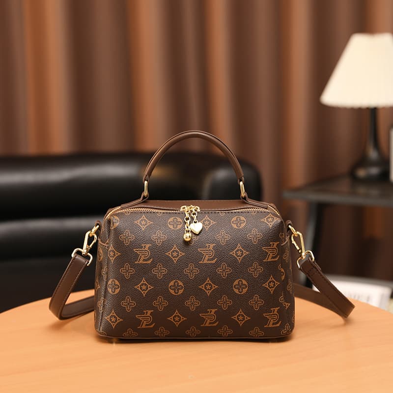 Korean style light luxury and western style early spring bag women's fashion new niche print Boston pillow bag hand-held crossbody bag