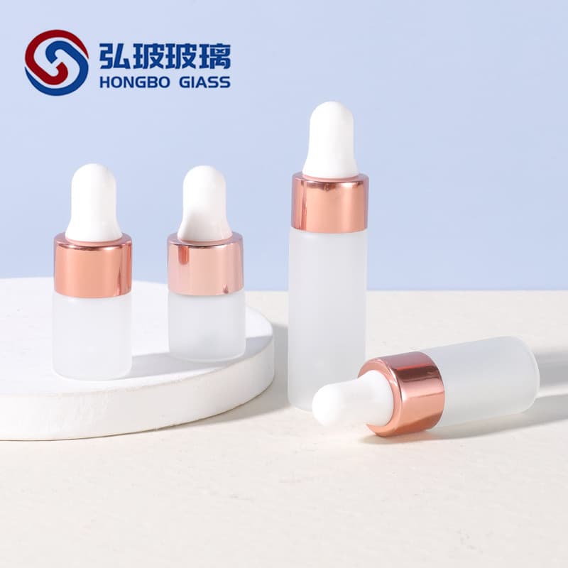 Manufacturer in-stock 1ml 2ml 3ml 5ml rose gold dropper bottle, frosted glass stock solution refill bottle, trial size cherry blossom pink
