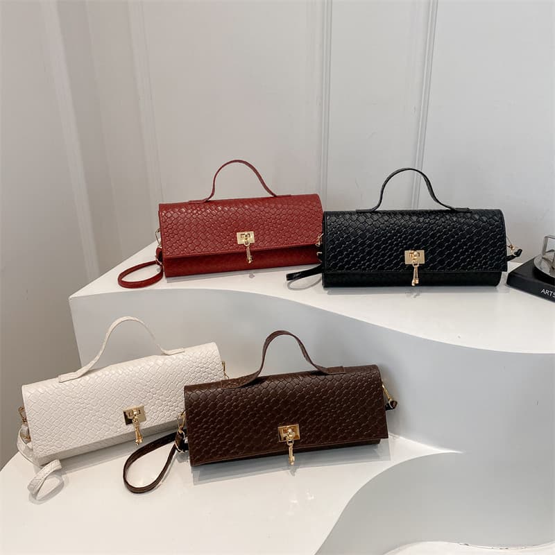 2025 Solid Color Casual Lock Closure Fashion Refined Woven Large Capacity Chic Horizontal Crossbody Shoulder Baguette Bag for Women