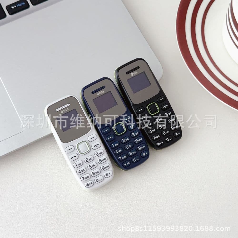 Cross-border Hot Seller BM310 Low-cost Mini Bar Phone with Dual SIM, Compact Size, and Multiple Languages