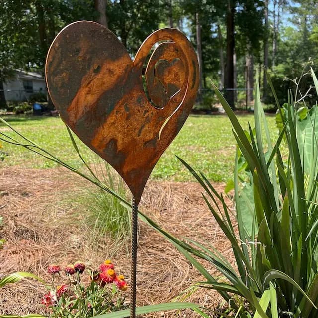 A Rusted Heart Stake in the Garden Metal Garden Rusted Heart Iron Heart