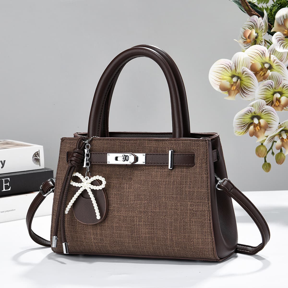 2026 new light luxury plaid stitching Kelly small bag women's Korean temperament commuting single shoulder crossbody bag supply wholesale