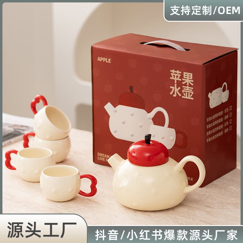 Apple-themed high-end home ceramic tea set with teapot and cups in a gift box, ideal for housewarming presents.