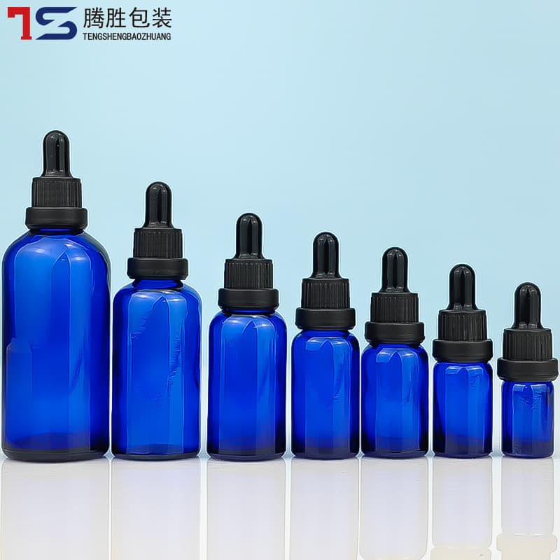 Blue essential oil bottles, security ring glass containers, rubber dropper bottles for serum raw materials, cosmetic dispensing bottles