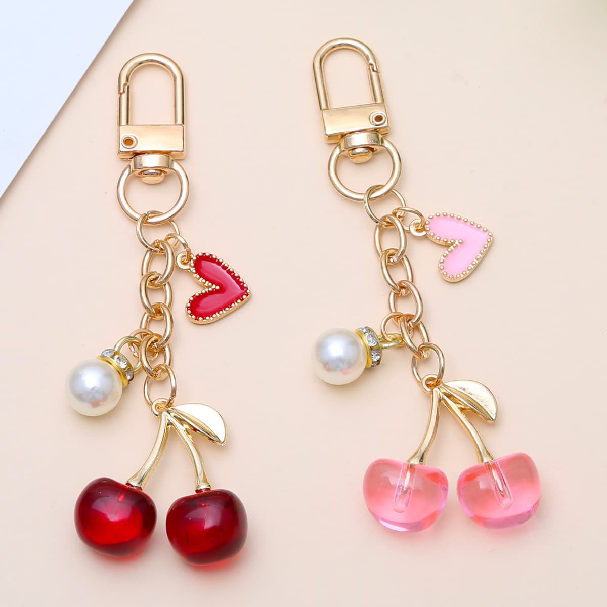 European and American Cross-Border Popular Cherry Heart Keychain, Niche Luxury Imitation Pearl Sweet Bag Pendant, Wholesale from Manufacturer