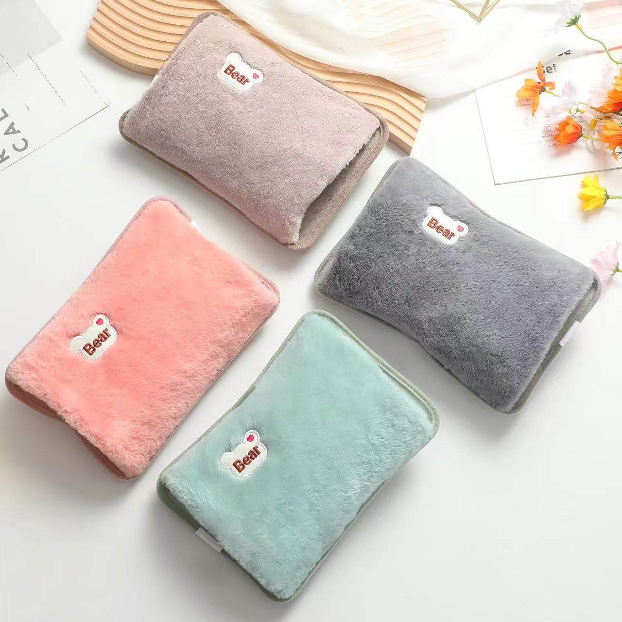 Non-standard, in-stock, cross-border exclusive cartoon rechargeable hot water bottle with embroidered bear head, hand warmer, European standard.