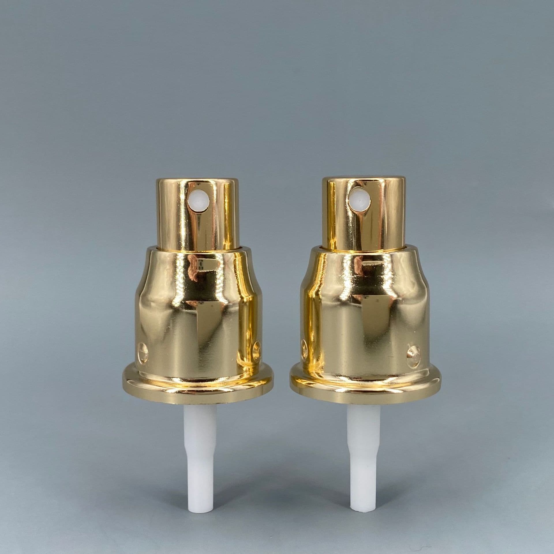 20-tooth electroplated aluminum oxide aluminum three-point arc shoulder skirt edge spray pump, lotion pump, transparent cover powder pump for cosmetic packaging