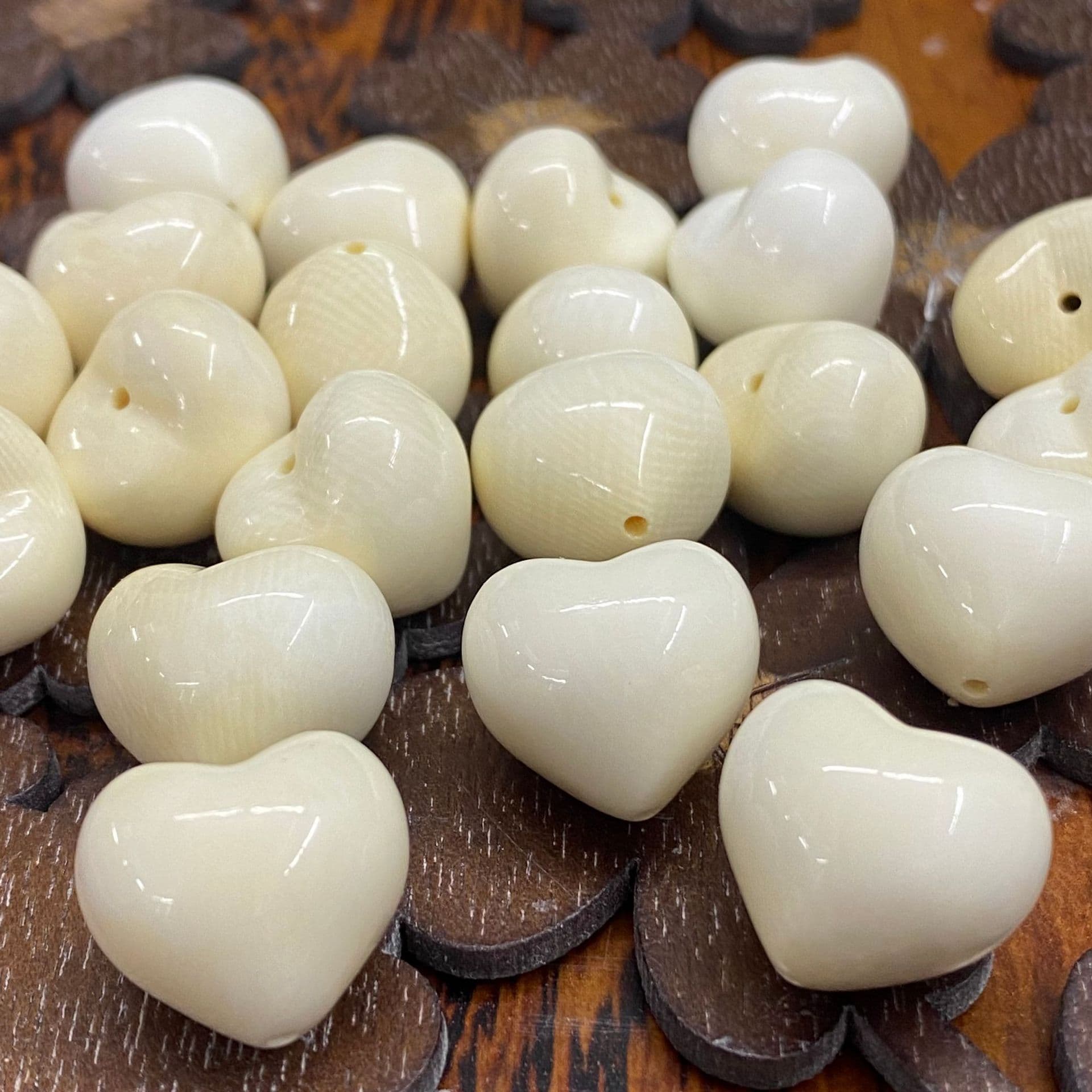 Natural mammoth ivory carvings: heart, peach heart, heart-shaped accessories, spacer beads, stars, moon, DIY jewelry.