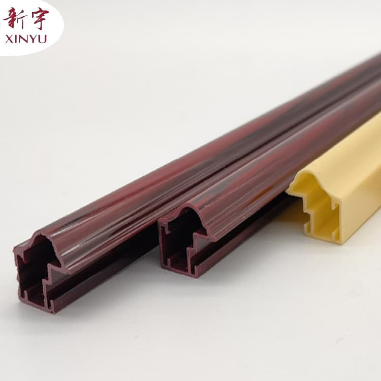 Wood grain rubber and plastic stationery strips, door and window frame strips, photo frame strips, PVC multi-color profiles, cold extruded plastic profiles.