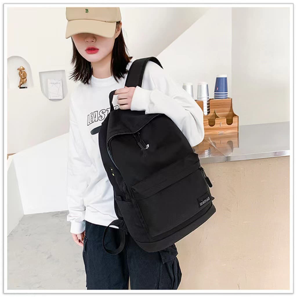 Ultra-light trendy backpack for men and women, simple and lightweight, suitable for middle and high school students, casual outdoor travel backpack, dropshipping available