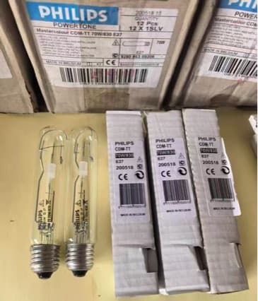 Philips CDM-TT70W/830E27 ceramic metal halide lamp, made in Belgium, E27 screw base, 70W wattage.