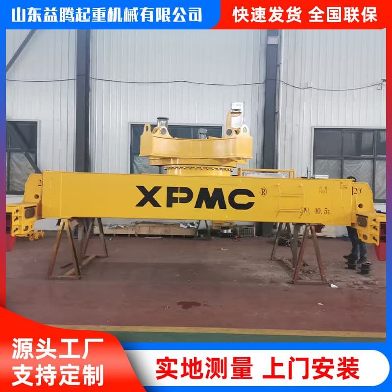Semi-automatic tire-type container spreaders, liftable and rotatable for dock container handling.