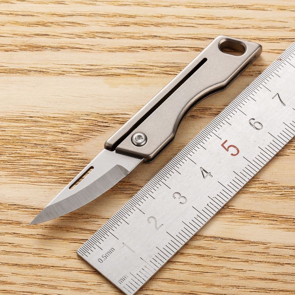 Titanium Alloy Mini Folding Knife High Hardness D2 Steel Sharp Small Knife Keychain Pendant for Opening Packages and Boxes
